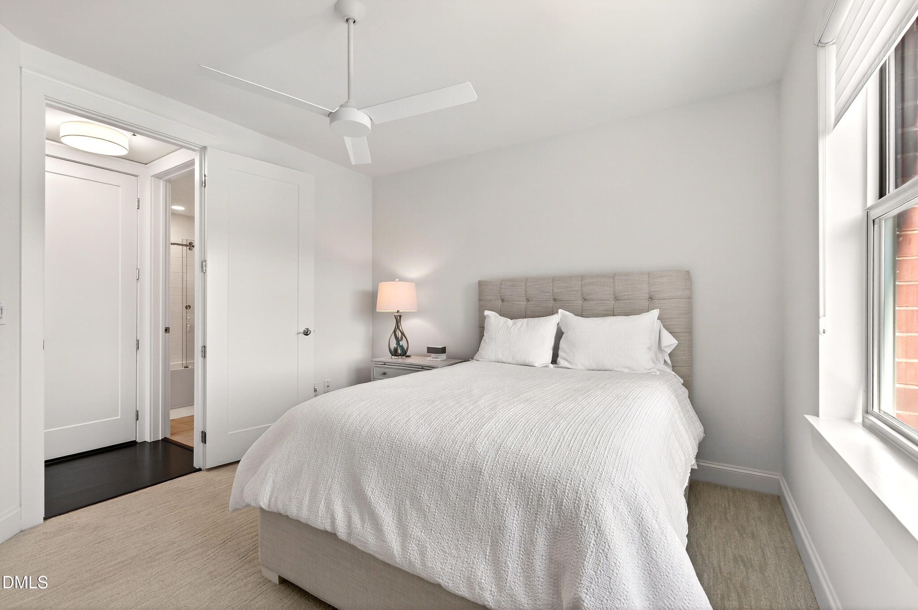 618 North Boylan Avenue, Unit 506 Raleigh, NC 27603 - Photo 31 of 71 a bedroom with a bed and a window