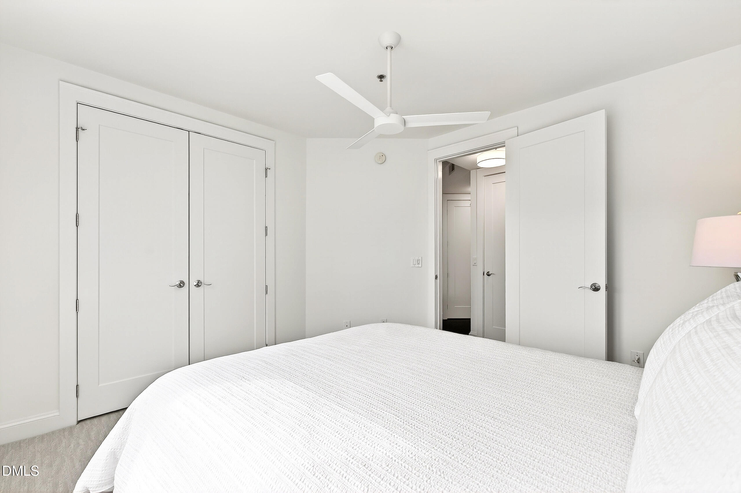 618 North Boylan Avenue, Unit 506 Raleigh, NC 27603 - Photo 32 of 71 a bedroom with a bed and a closet