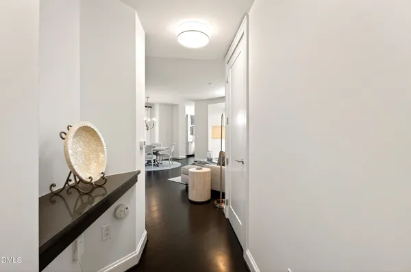 a view of a bathroom with a sink and mirror
