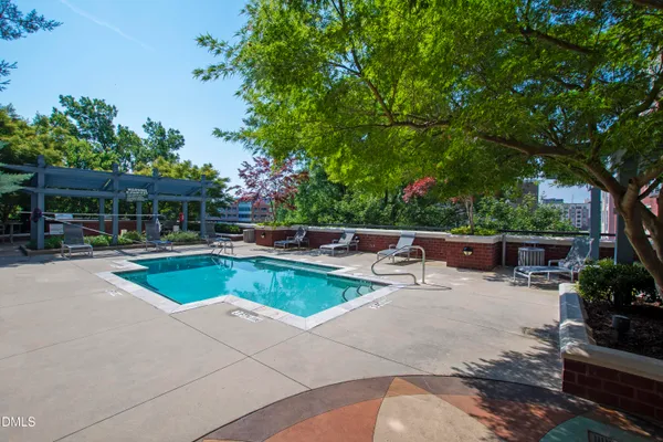 a kitchen with stainless steel appliances a stove sink and refrigerator