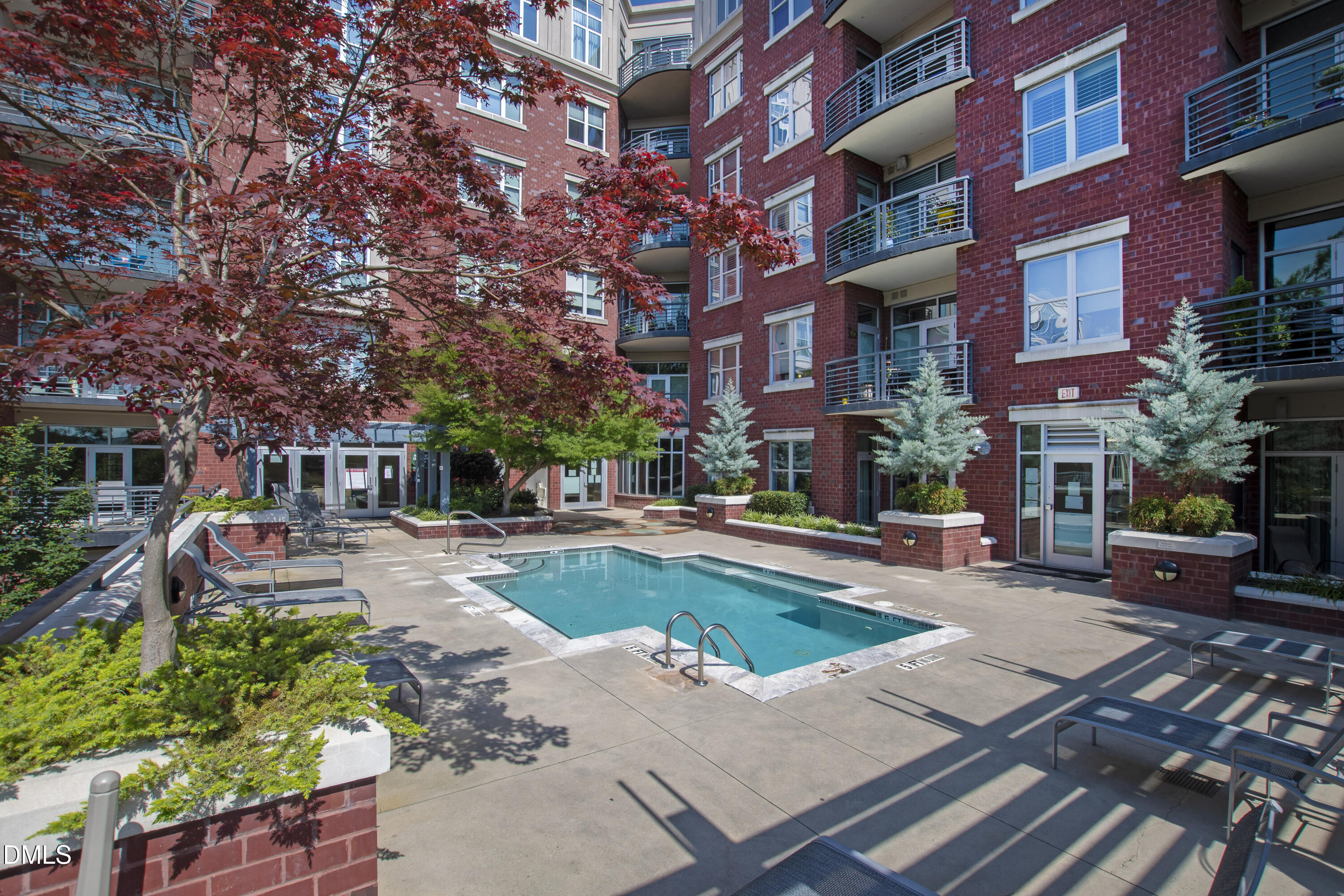 618 North Boylan Avenue, Unit 506 Raleigh, NC 27603 - Photo 43 of 71 a view of a building with garden and sitting area