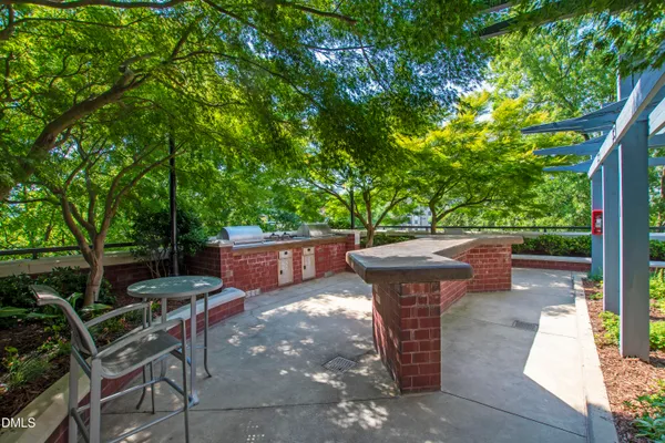 a view of roof deck with patio
