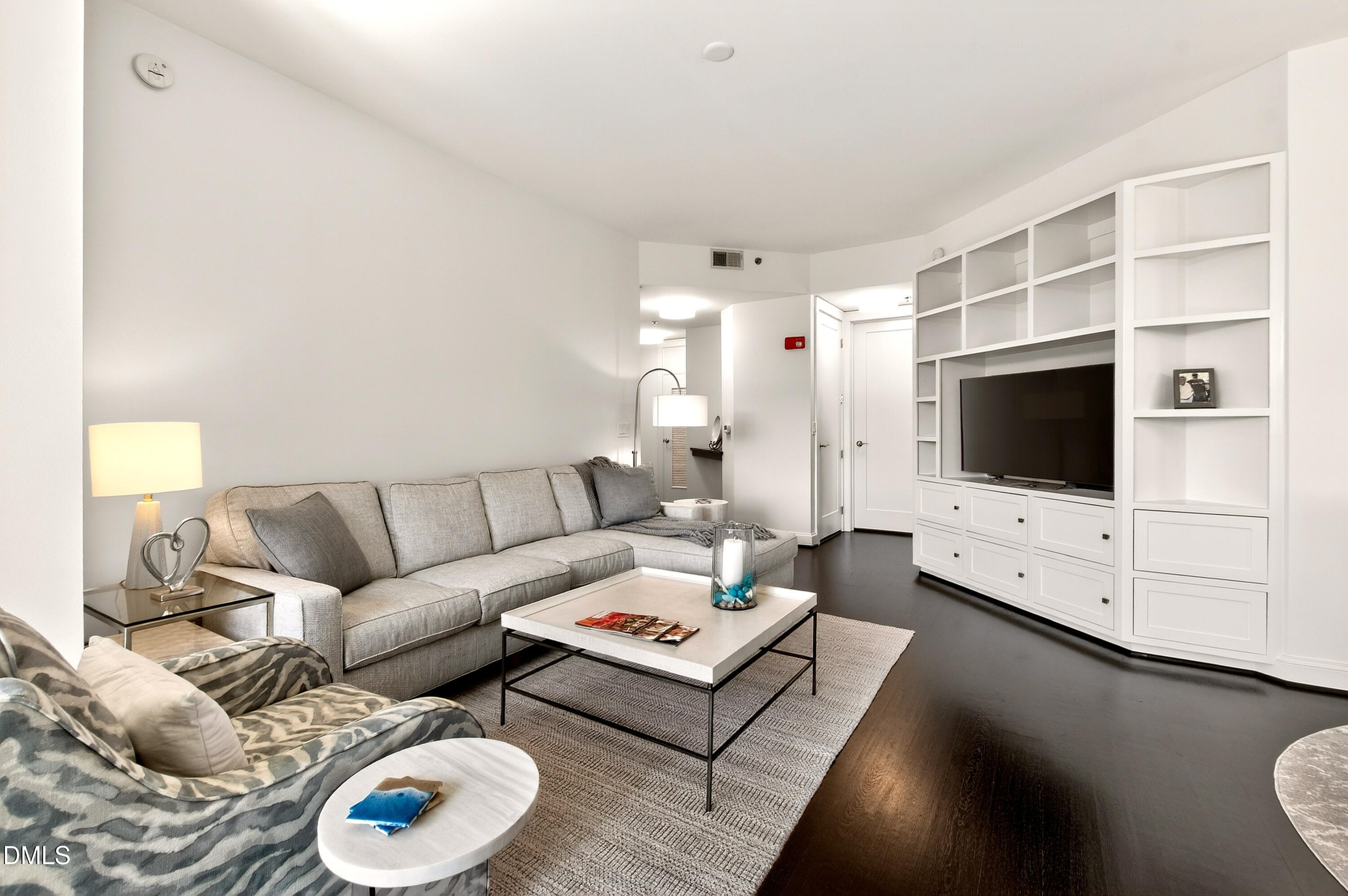 618 North Boylan Avenue, Unit 506 Raleigh, NC 27603 - Photo 9 of 71 a living room with furniture and a flat screen tv