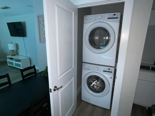 a view of livingroom with washer and dryer