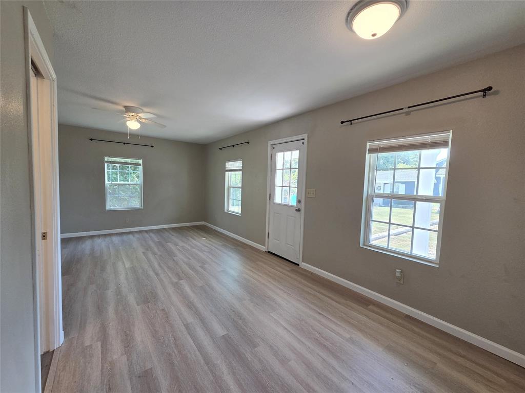 1901 Highway 276, Unit 4 West Tawakoni, TX 75474 - Photo 10 of 11 a view of an empty room and window