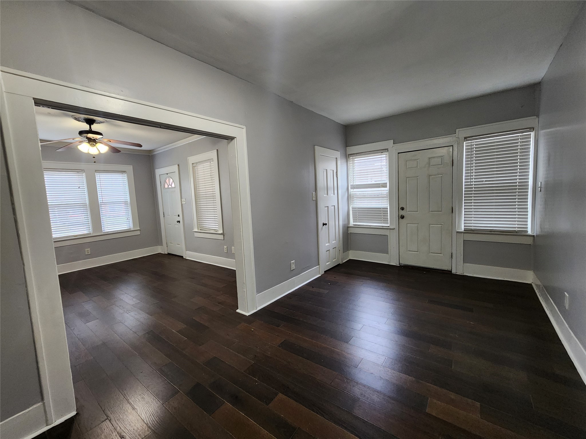 2504 Isabella Street Houston, TX 77004 - Photo 5 of 13 an empty room with wooden floor and windows