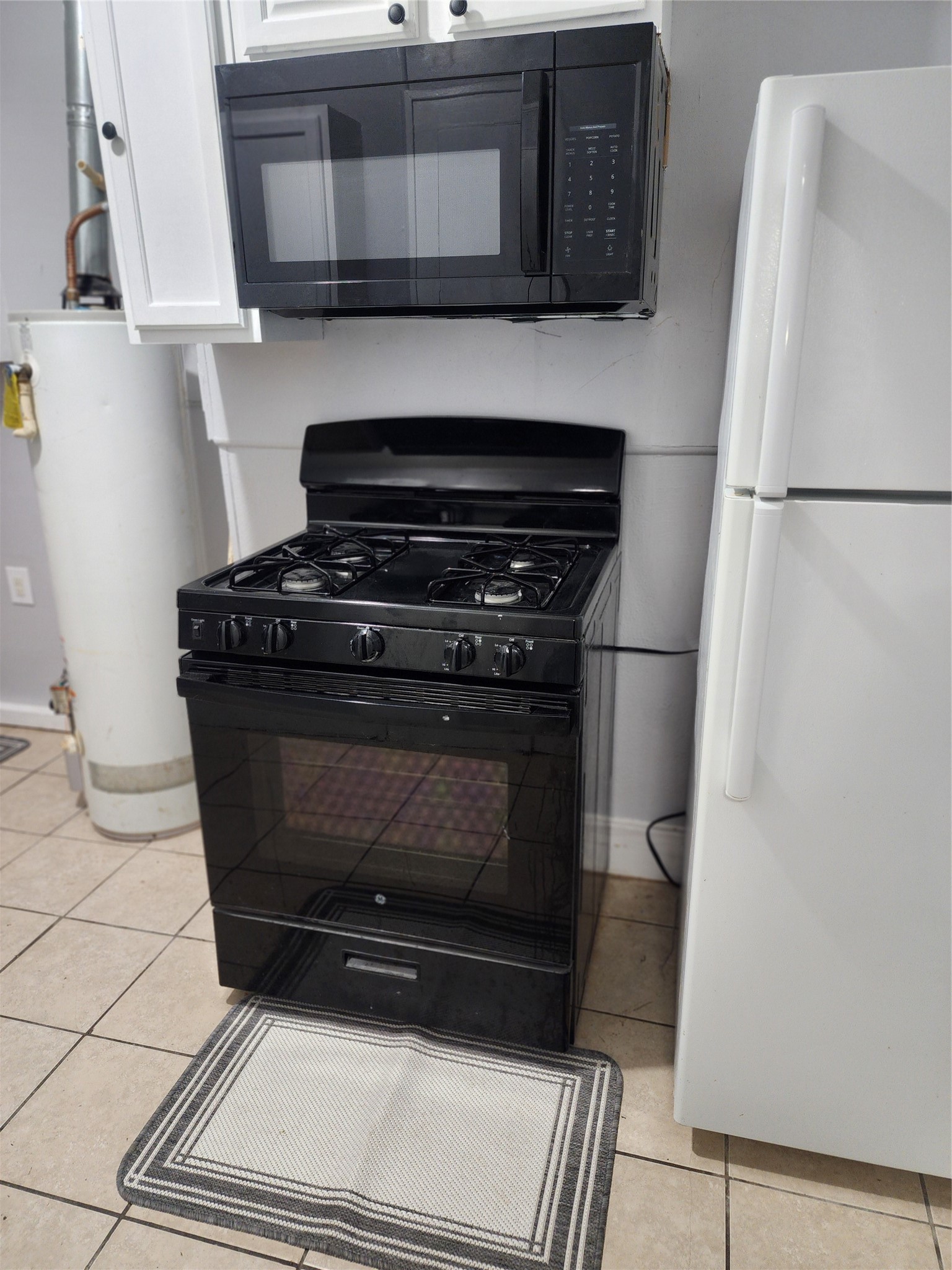2504 Isabella Street Houston, TX 77004 - Photo 9 of 13 a stove top oven sitting inside of a kitchen