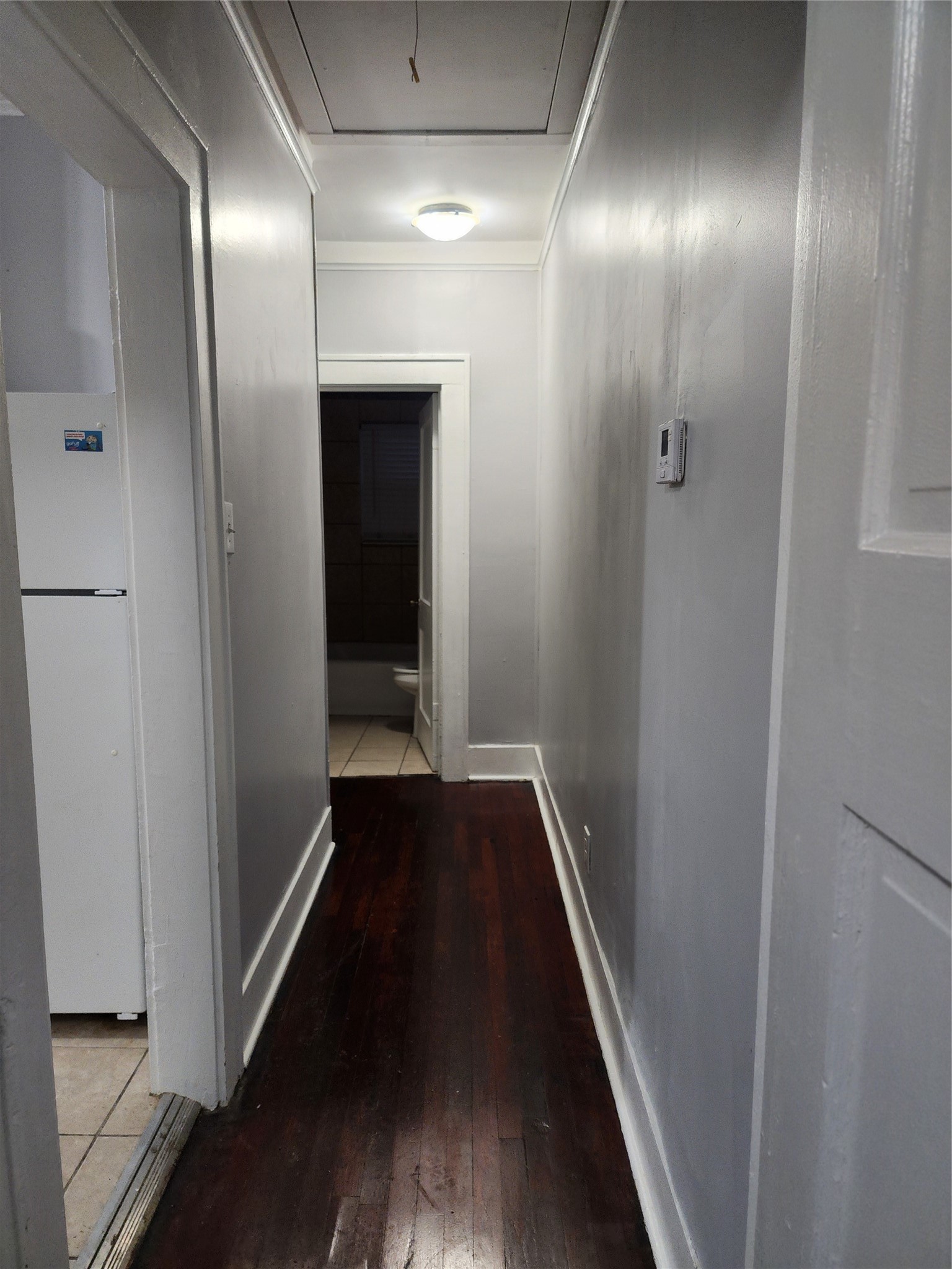 2504 Isabella Street Houston, TX 77004 - Photo 10 of 13 a view of a hallway with wooden floor