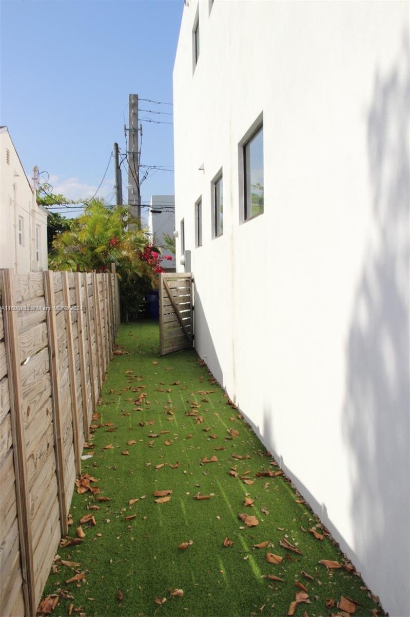 2944 Southwest 27th Terrace, Unit 2944 Miami, FL 33133 - Photo 40 of 44 a view of a house with backyard