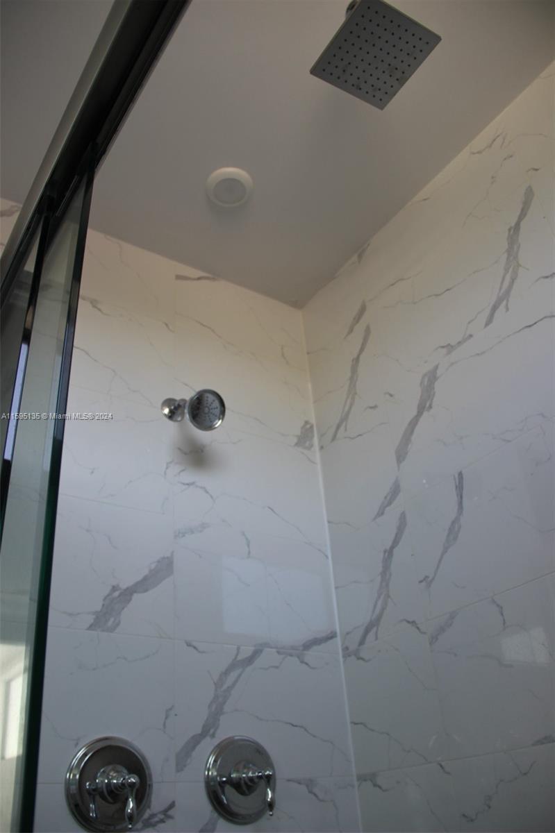 2944 Southwest 27th Terrace, Unit 2944 Miami, FL 33133 - Photo 44 of 44 a bathroom with a shower