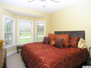 3527 Nestling Lane Fort Mill, SC 29708 - Photo 15 of 16 a bedroom with a large bed and a window