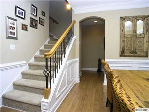 3527 Nestling Lane Fort Mill, SC 29708 - Photo 5 of 16 a view of a staircase with wooden floor and a rug