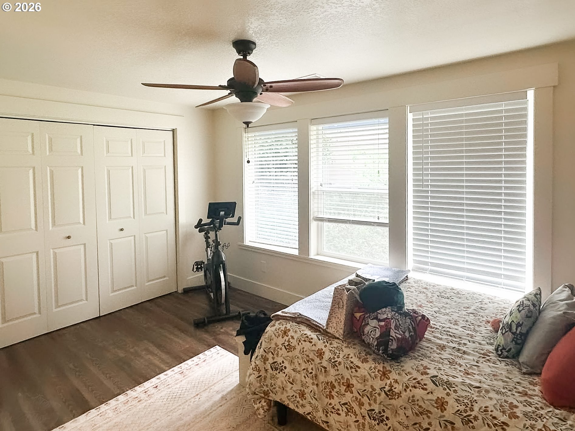 1601 Spruce Drive Seaside, OR 97138 - Photo 6 of 7 a bedroom with a bed and a window
