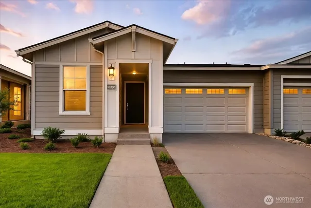 a front view of a house with yard