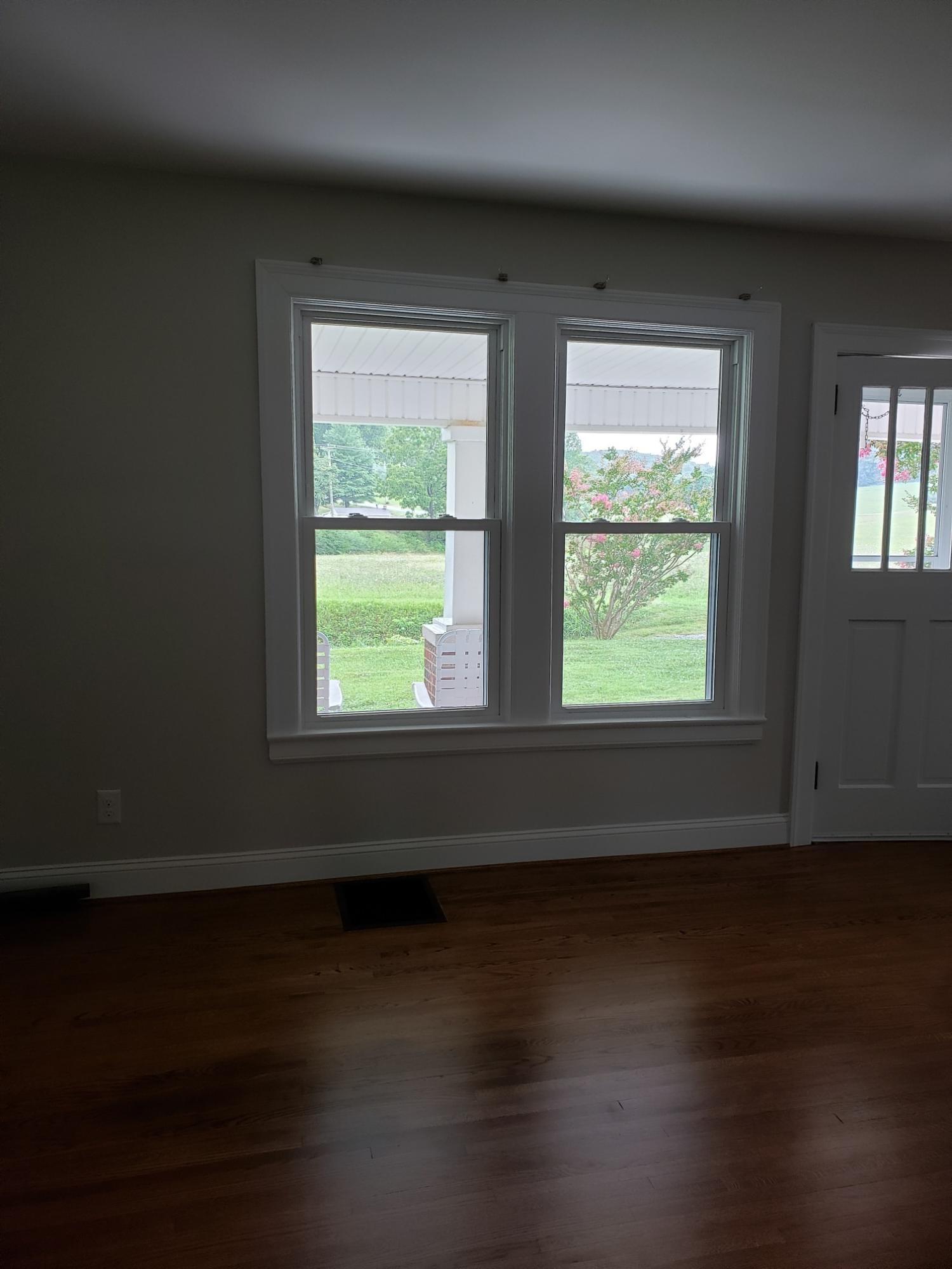 7374 Dry Hill Road Ferrum, VA 24088 - Photo 8 of 26 a view of wooden floor and windows in a room