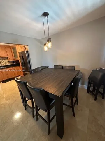 a workspace with furniture and window