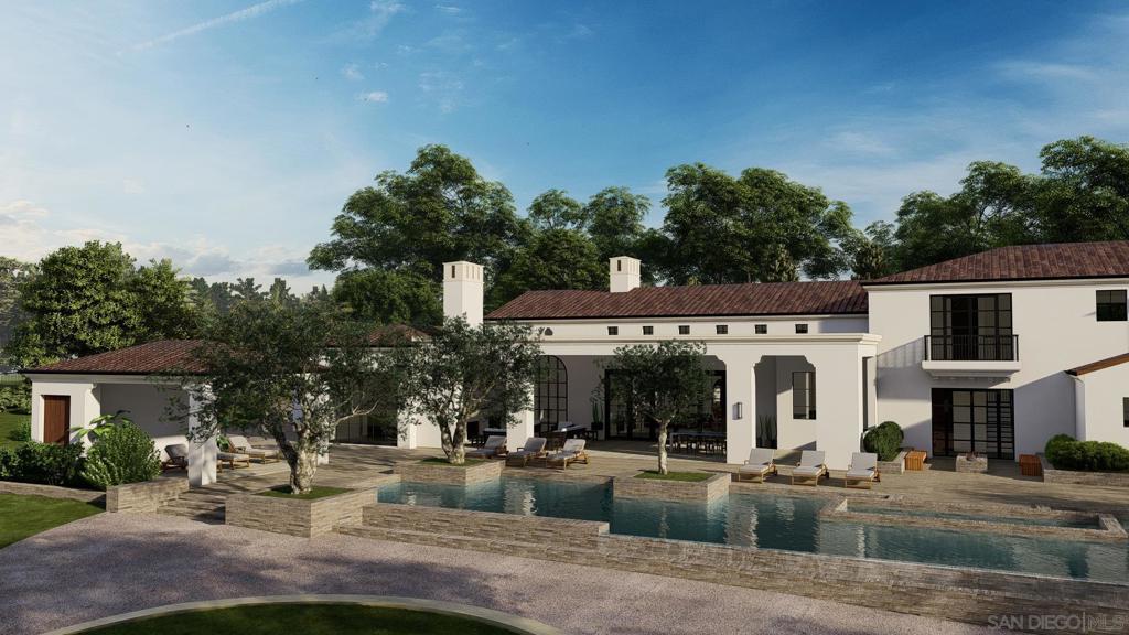 4919 El Secreto Rancho Santa Fe, CA 92067 - Photo 7 of 13 a view of a building with that has couches and table and chairs with wooden fence