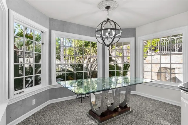 a living room with large windows