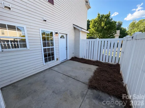 a view of stairs and yard