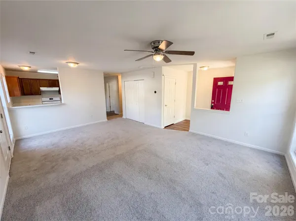 a view of a livingroom with a flat screen tv