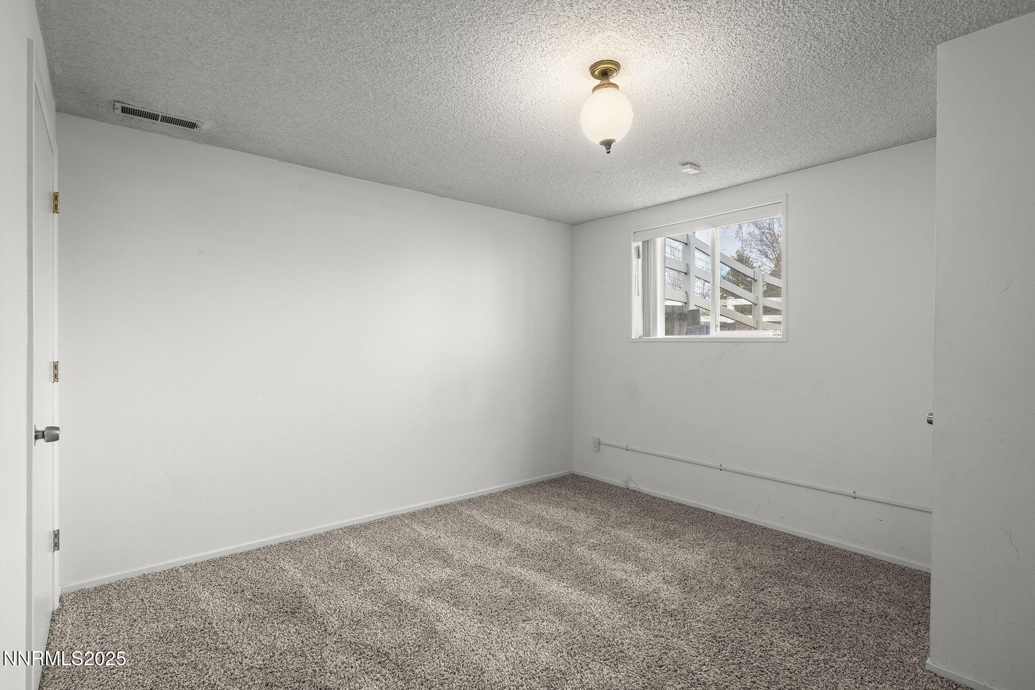 8355 Lakeside Drive Reno, NV 89511 - Photo 24 of 36 a view of empty room with window