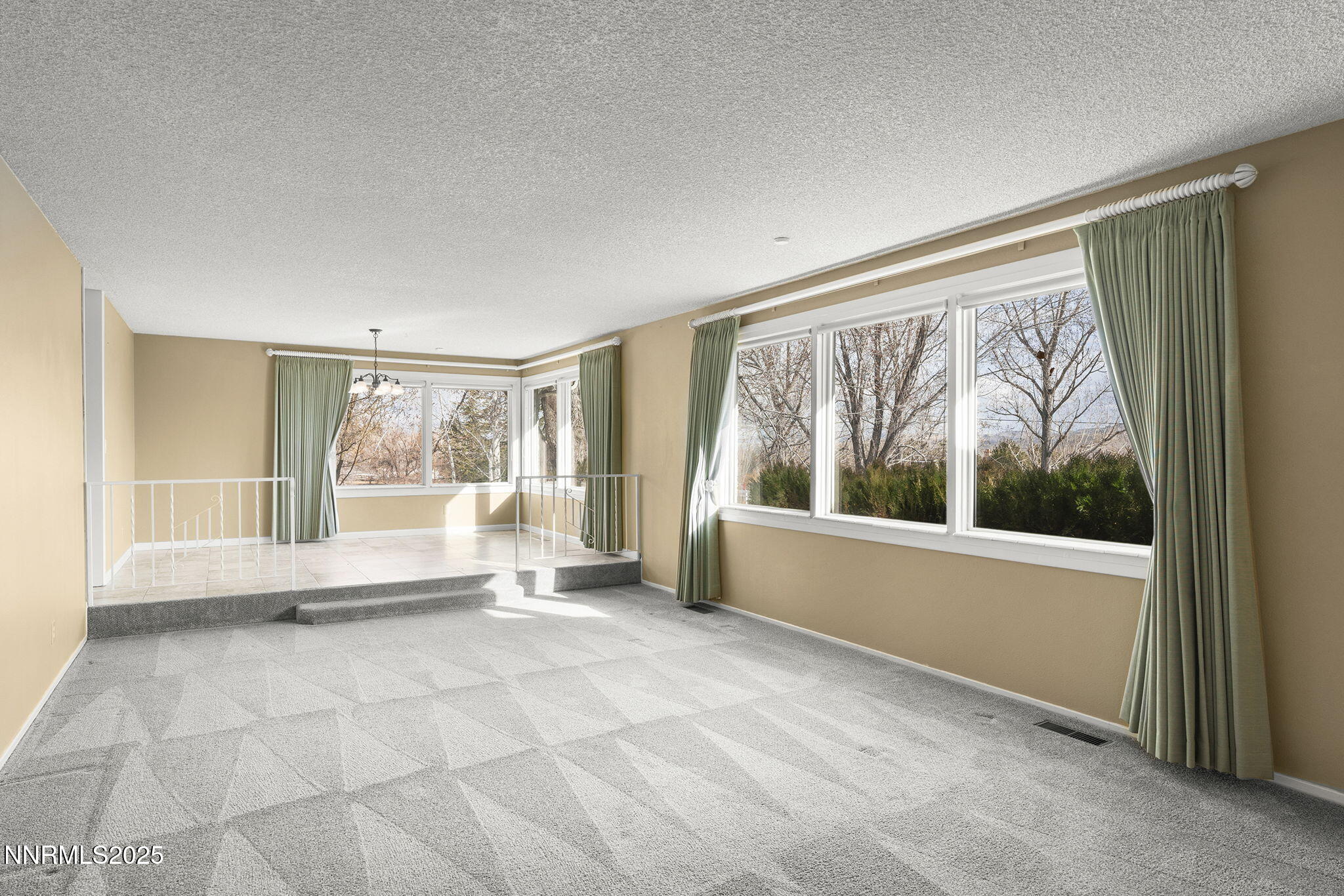 8355 Lakeside Drive Reno, NV 89511 - Photo 9 of 36 a view of an empty room with a window