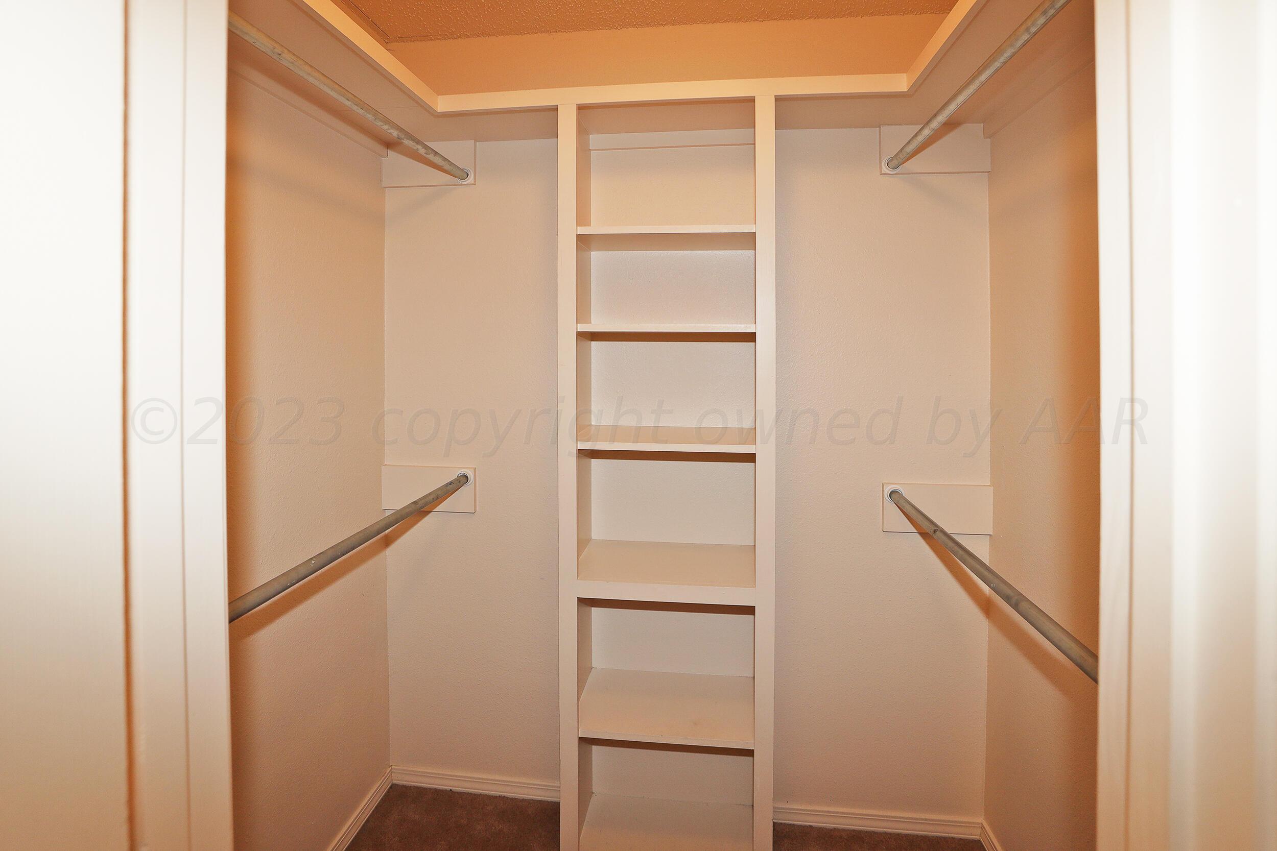 1025 Ketler Street Amarillo, TX 79104 - Photo 17 of 29 a view of an empty walk in closet