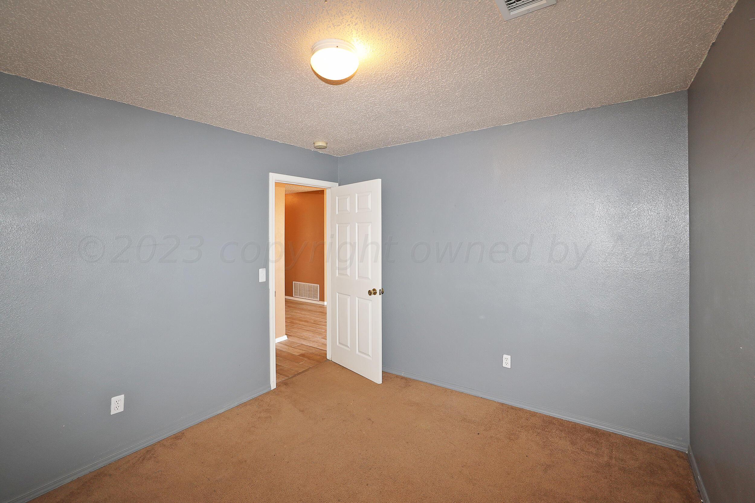1025 Ketler Street Amarillo, TX 79104 - Photo 27 of 29 a view of an empty room