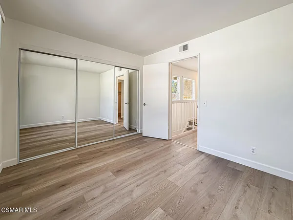 a view of small space with racks on the wall
