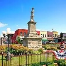 a cars parked in front of a building