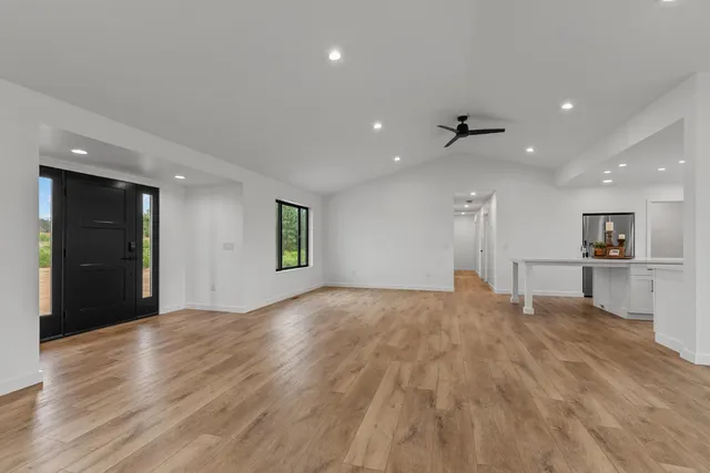 a view of a livingroom with a ceiling fan