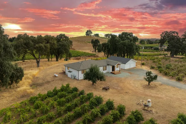 a view of a lake with a yard