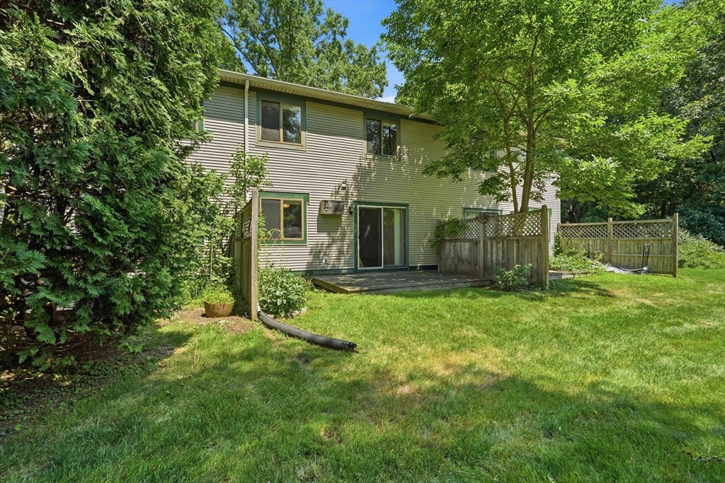 170 East Hadley Road, Unit 96 Amherst, MA 01002 - Photo 28 of 36 a front view of house with yard and green space