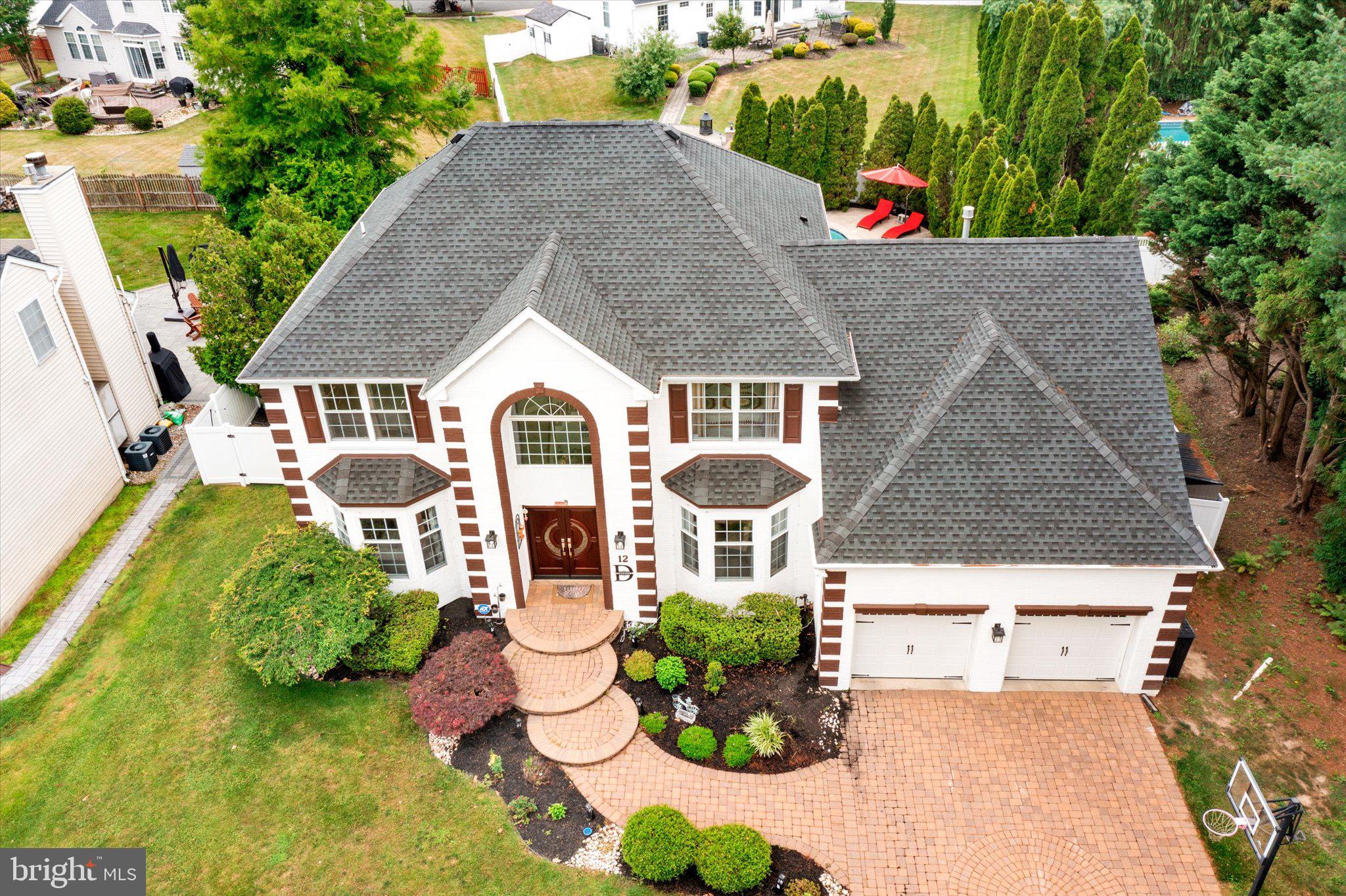 12 Wendover Road East Windsor, NJ 08520 - Photo 38 of 51 Elegant home with lush landscaping.