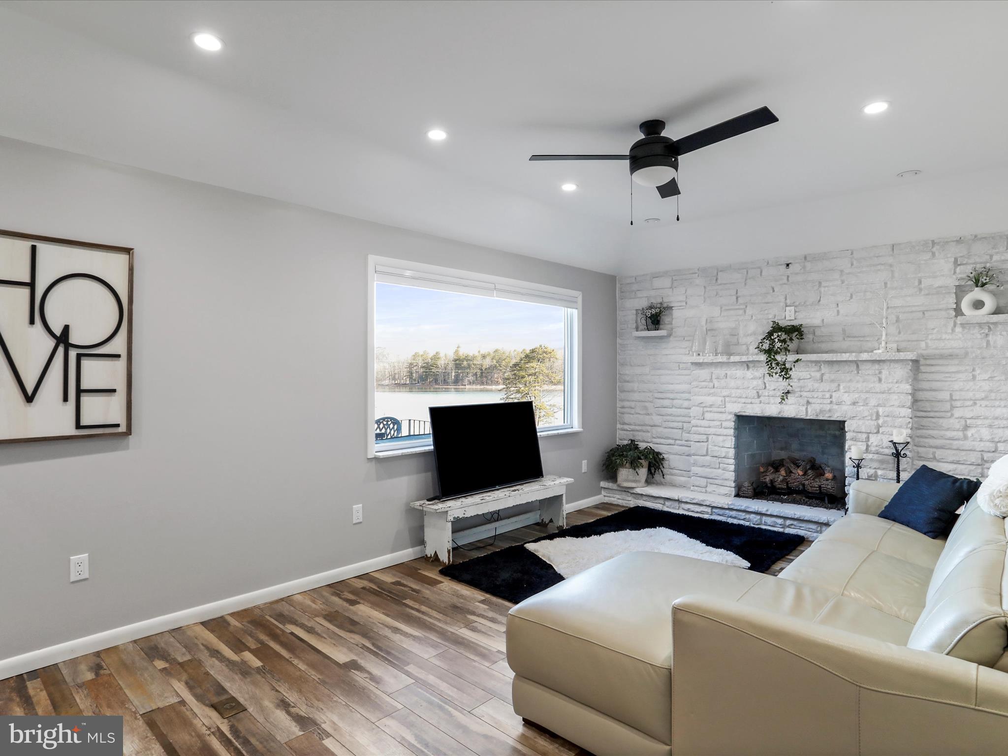 468 Pritts Road Swanton, MD 21561 - Photo 11 of 58 a living room with furniture and a flat screen tv