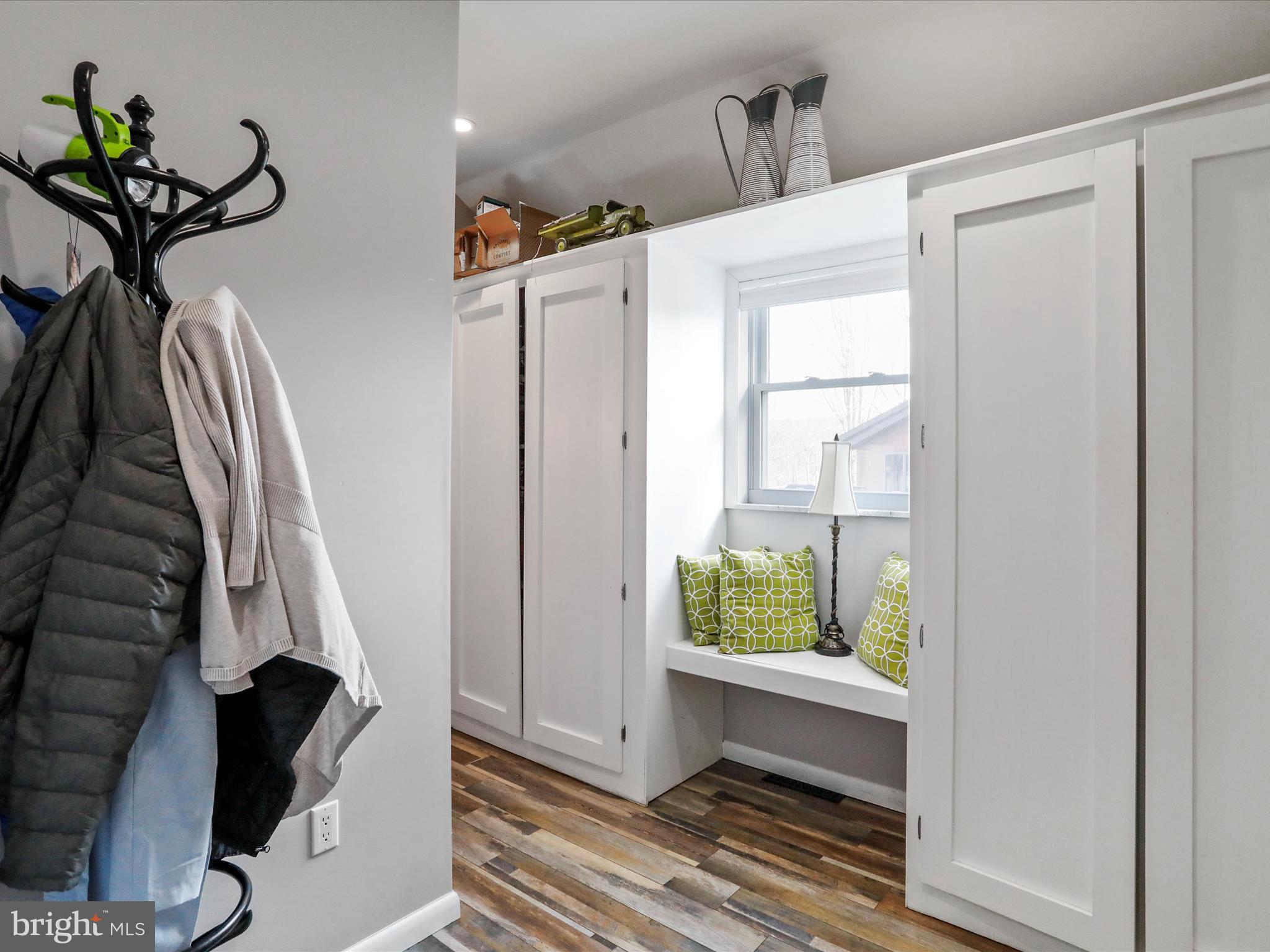 468 Pritts Road Swanton, MD 21561 - Photo 14 of 58 a view of entryway with wooden floor and front door