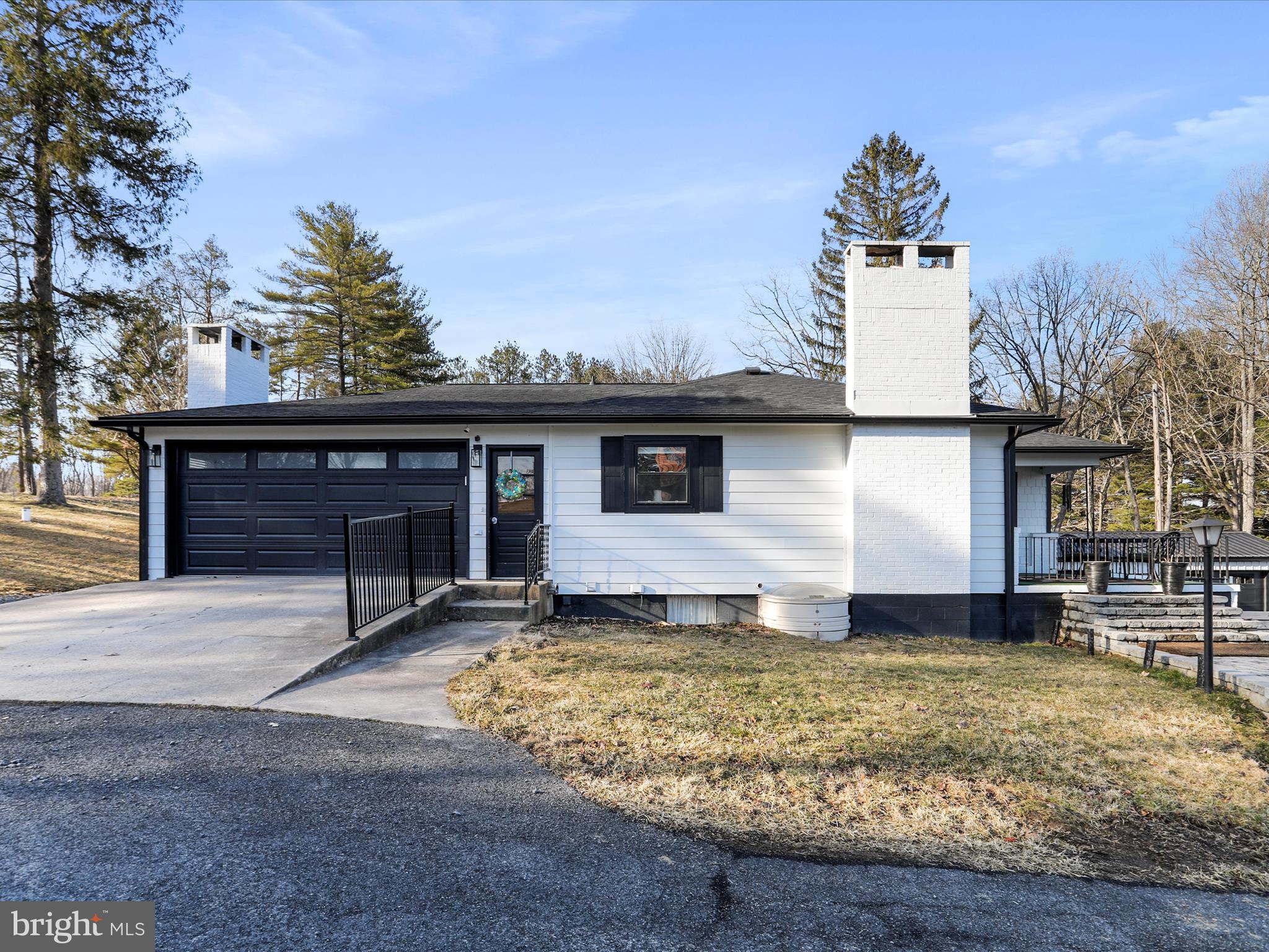 468 Pritts Road Swanton, MD 21561 - Photo 3 of 58 a view of a house with a yard and garage