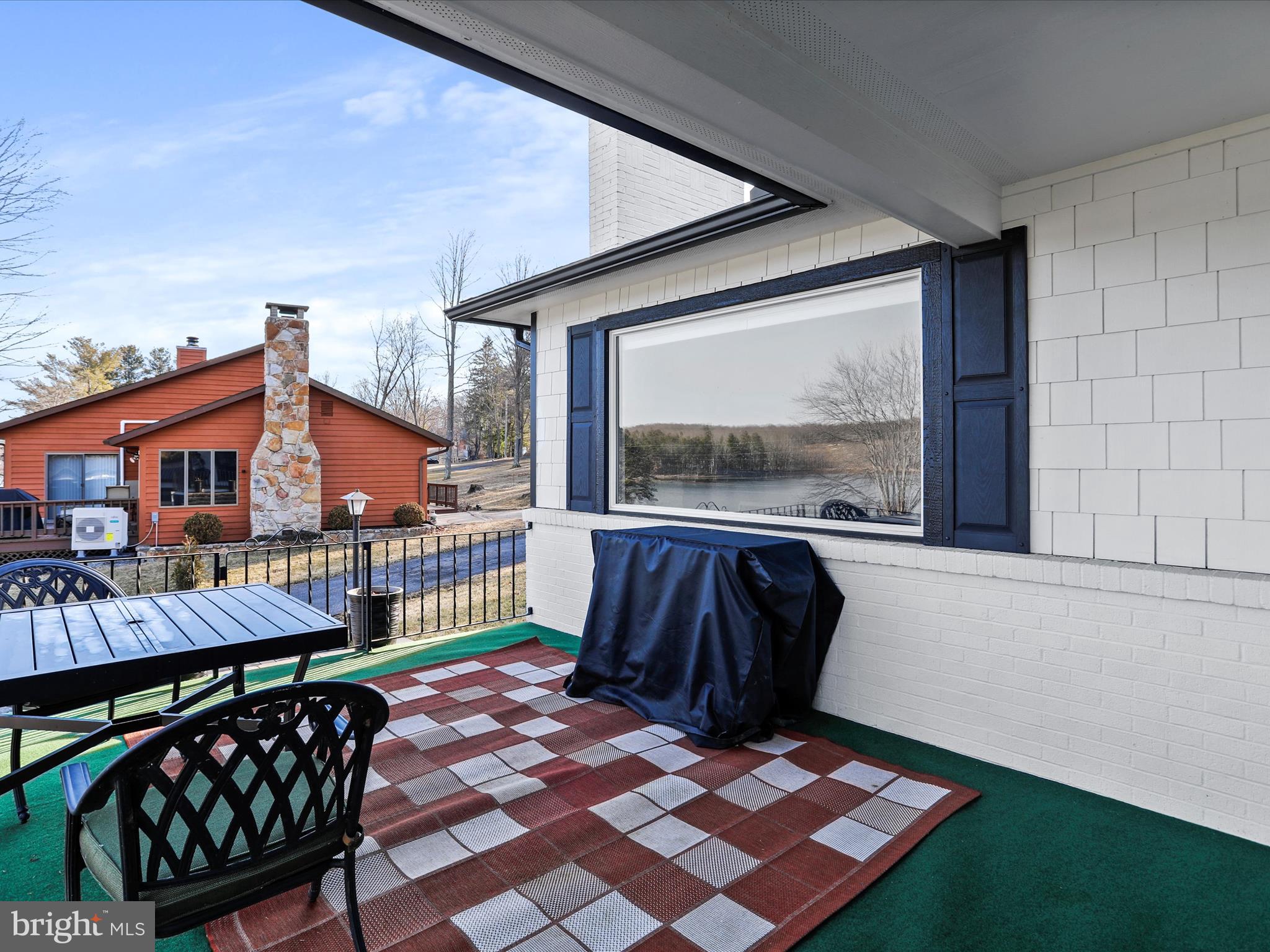468 Pritts Road Swanton, MD 21561 - Photo 41 of 58 a balcony view with a seating space