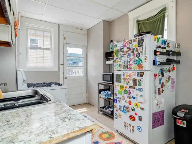 a room with furniture and a window