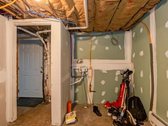 a view of a chairs and table in the balcony