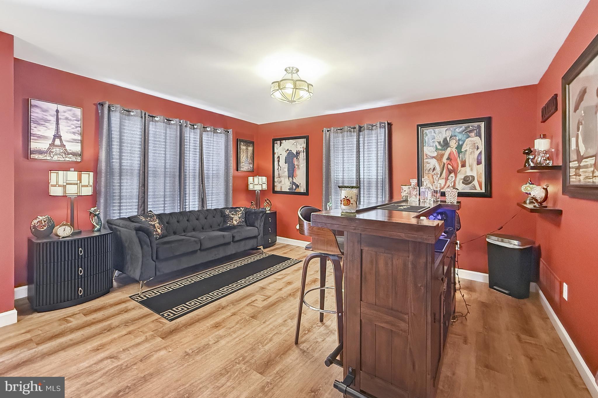 87 Trapper Lane Magnolia, DE 19962 - Photo 6 of 39 a living room with furniture and a large window