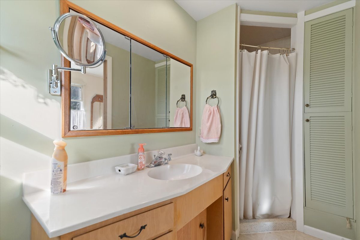 116 East Monaville Road Lake Villa, IL 60046 - Photo 18 of 51 a bathroom with a sink vanity and a mirror