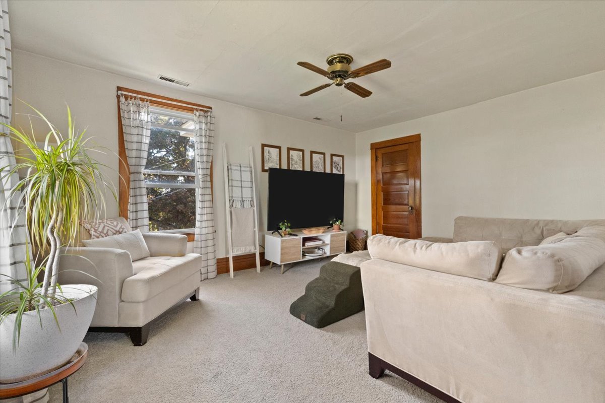 116 East Monaville Road Lake Villa, IL 60046 - Photo 27 of 51 a living room with furniture and a flat screen tv