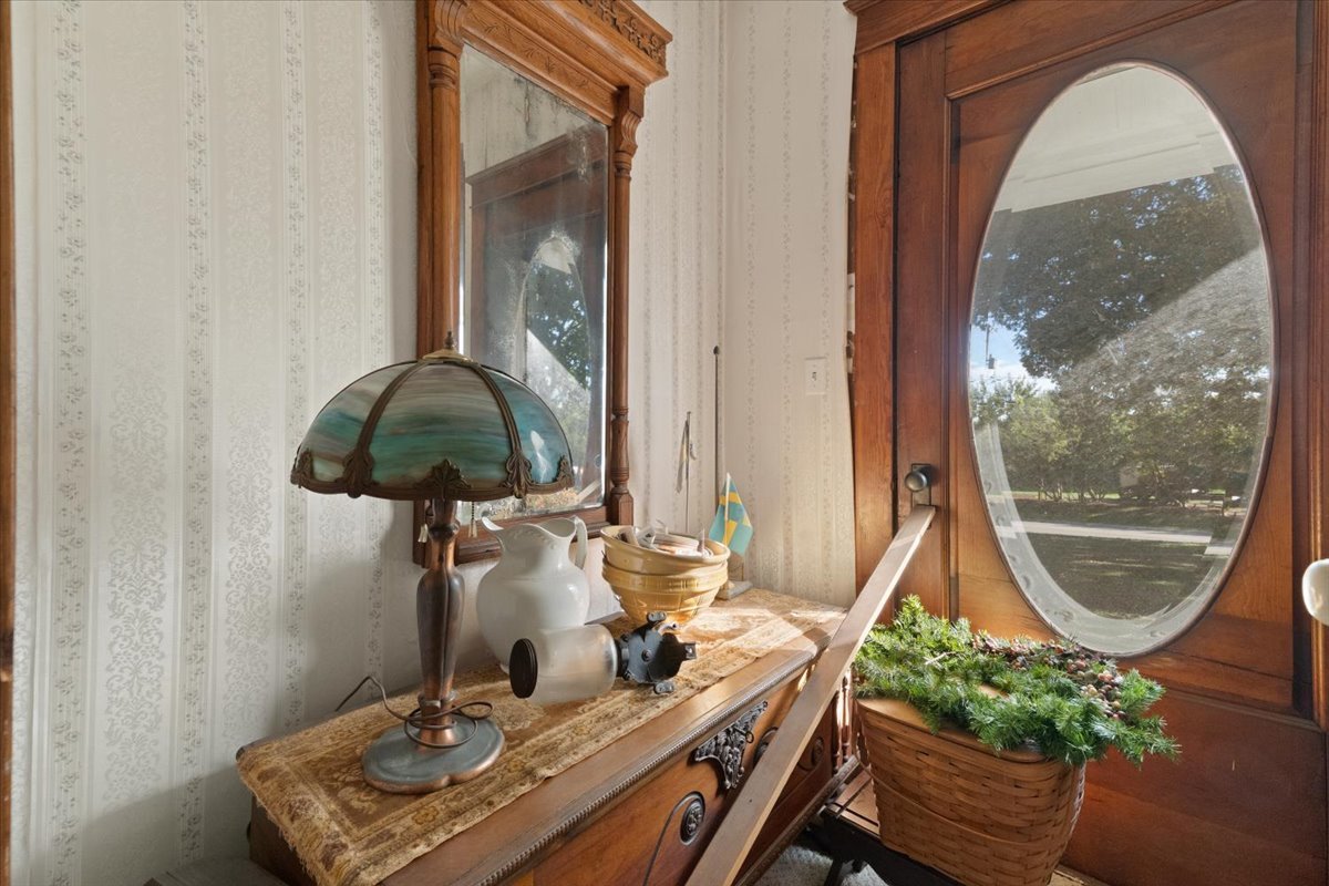 116 East Monaville Road Lake Villa, IL 60046 - Photo 3 of 51 a room with painting on the wall and a potted plant