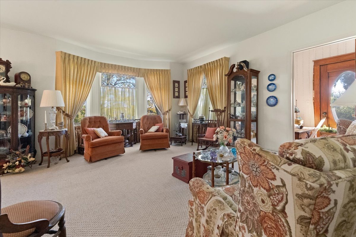 116 East Monaville Road Lake Villa, IL 60046 - Photo 6 of 51 a living room with furniture and a large window