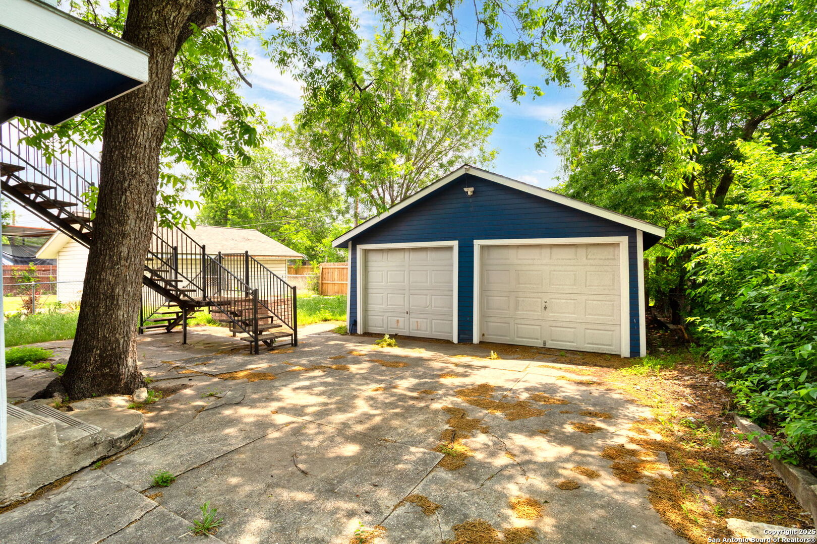 1336 West Ridgewood Court, Unit 1 San Antonio, TX 78201 - Photo 15 of 15 a view of a house with backyard porch and sitting area