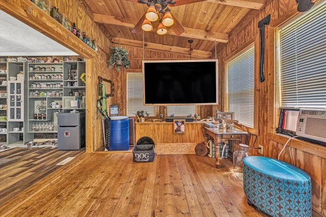 a view of swimming pool with seating space