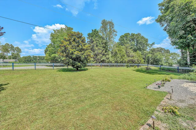 a view of a lake with a big yard