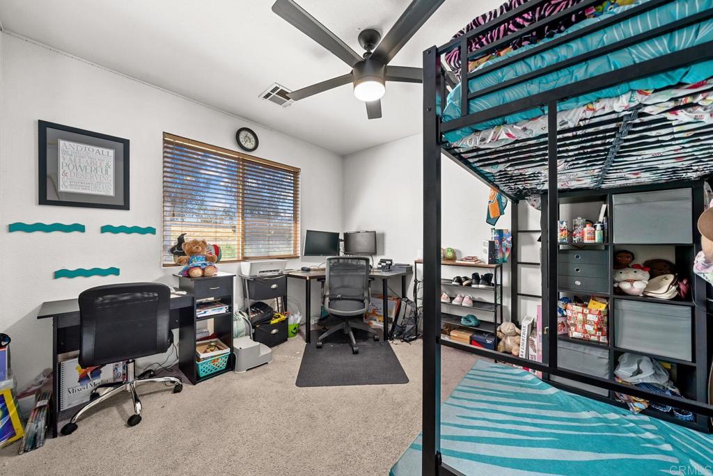 832 Laffey Lane El Cajon, CA 92021 - Photo 21 of 47 a view of a livingroom with workspace and a window