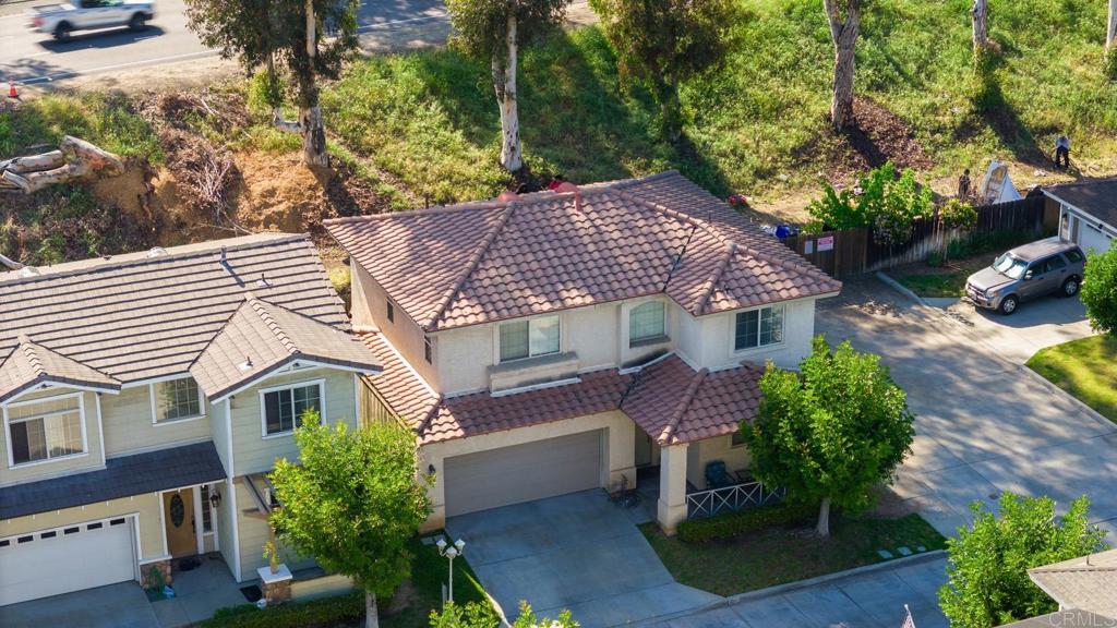 832 Laffey Lane El Cajon, CA 92021 - Photo 41 of 47 a front view of a house with garden